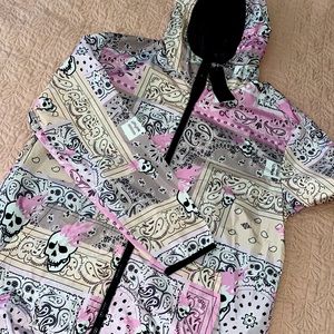 Pink and white rain jacket